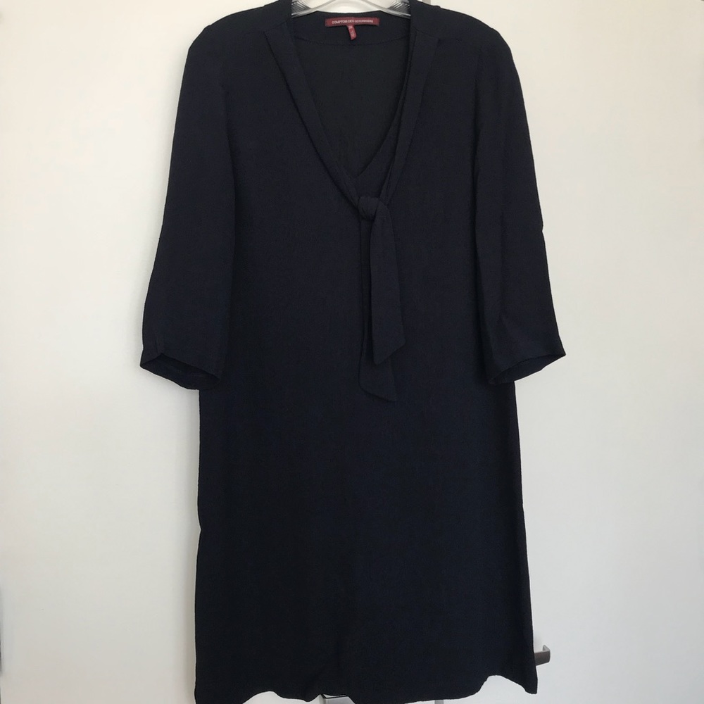 Navy blue work dress with pussy tie bow